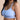Woman wearing a light blue sports bra with 'Habits' branding on a beige background